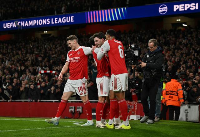 Arsenal's English midfielder #41 Declan Rice celebrates scoring the team's second goal during the UEFA Champions League, last 16 second leg football match between Arsenal and Bayer Leverkusen at the Emirates Stadium in north London on March 17, 2026. (Photo by Glyn KIRK / AFP)