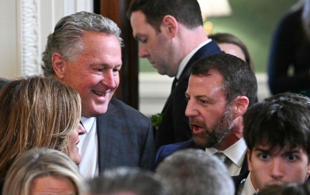 US Senator Markwayne Mullin, Republican from Oklahoma, tapped by US President Donald Trump to replace US Homeland Security Secretary Kristi Noem attends an event with Irish Prime Minster Micheal Martin and US President Donald Trump in the East Room of the White House in Washington, DC on March 17, 2026. (Photo by Jim WATSON / AFP)