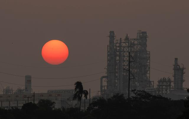 (FILES) View of the Olmeca oil refinery belonging to the company Petroleos Mexicanos (PEMEX), which along with six others is part of the National Refining System (SNR) located in Paraiso, Tabasco state, Mexico on May 20, 2024. At least five people died on MArch 17, 2026, in a fire caused by bad weather at a refinery owned by the state-run company Petroleos Mexicanos (Pemex) in southeastern Mexico, the company reported. (Photo by Yuri CORTEZ / AFP)