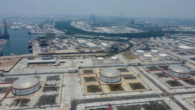(FILES) Aerial view taken on May 20, 2024 shows the Olmeca oil refinery  belonging to the company Petroleos Mexicanos (PEMEX), which along with six others is part of the National Refining System (SNR) located in Paraiso, Tabasco state, Mexico. At least five people died on MArch 17, 2026, in a fire caused by bad weather at a refinery owned by the state-run company Petroleos Mexicanos (Pemex) in southeastern Mexico, the company reported. (Photo by Yuri CORTEZ / AFP)