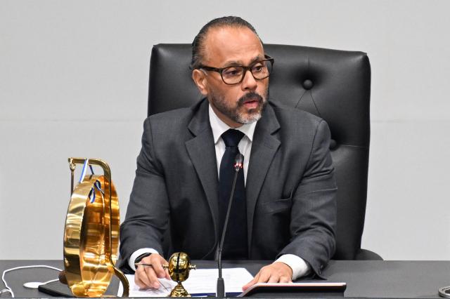 The president of El Salvador’s Congress and member of the ruling party, Ernesto Castro, attends the session on the constitutional reform to approve life imprisonment in San Salvador on March 17, 2026. The government of Salvadoran President Nayib Bukele proposed on March 17, in the Congress it controls, a constitutional reform that establishes life imprisonment for ‘murderers, rapists, and terrorists,’ after accusing NGOs of protecting gang members. (Photo by Marvin RECINOS / AFP)