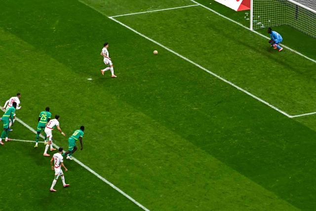 (FILES) Morocco's forward #10 Brahim Diaz kicks the ball to miss a penalty during the Africa Cup of Nations (CAN) final football match between Senegal and Morocco at the Prince Moulay Abdellah Stadium in Rabat on January 18, 2026. Senegal was stripped of its Africa Cup of Nations title by the Confederation of African Football (CAF) over its players' walk-off during the final, with Morocco declared champions, CAF announced on March 17, 2026. CAF confirmed the appeal by the Royal Moroccan Football Federation was upheld, overturning the earlier CAF Disciplinary Board decision that had allowed Senegal to keep their victory. (Photo by Paul ELLIS / AFP)