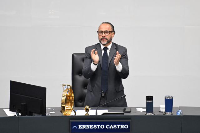 The president of El Salvador’s Congress and member of the ruling party, Ernesto Castro, celebrates after the vote during the constitutional reform to approve life imprisonment in San Salvador on March 17, 2026. The government of Salvadoran President Nayib Bukele proposed on March 17, in the Congress it controls, a constitutional reform that establishes life imprisonment for ‘murderers, rapists, and terrorists,’ after accusing NGOs of protecting gang members. (Photo by Marvin RECINOS / AFP)