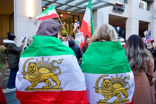 Iranian protesters gather during a demonstration organized by diaspora groups calling for political change in Iran and responding to appeals by opposition figures, outside the Iranian Interests Section in Washington, DC, on March 17, 2026, US President Donald Trump said that he does not know whether Iran's new supreme leader Mojtaba Khamenei is still alive, adding that Washington was unclear whom it could negotiate with in Tehran. (Photo by Amid FARAHI / AFP)