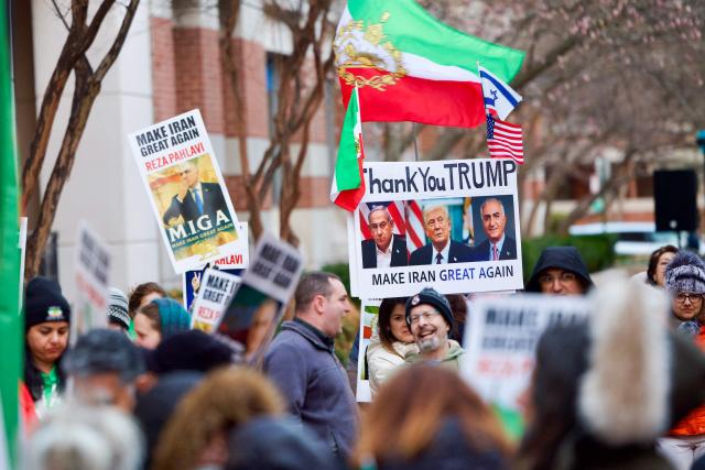 Iranian protesters gather during a demonstration organized by diaspora groups calling for political change in Iran and responding to appeals by opposition figures, outside the Iranian Interests Section in Washington, DC, on March 17, 2026, US President Donald Trump said that he does not know whether Iran's new supreme leader Mojtaba Khamenei is still alive, adding that Washington was unclear whom it could negotiate with in Tehran. (Photo by Amid FARAHI / AFP)