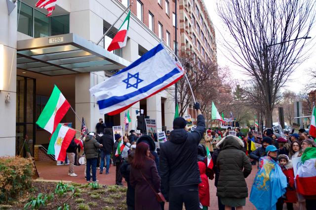 Iranian protesters gather during a demonstration organized by diaspora groups calling for political change in Iran and responding to appeals by opposition figures, outside the Iranian Interests Section in Washington, DC, on March 17, 2026, US President Donald Trump said that he does not know whether Iran's new supreme leader Mojtaba Khamenei is still alive, adding that Washington was unclear whom it could negotiate with in Tehran. (Photo by Amid FARAHI / AFP)