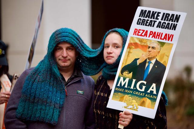Iranian protesters gather during a demonstration organized by diaspora groups calling for political change in Iran and responding to appeals by opposition figures, outside the Iranian Interests Section in Washington, DC, on March 17, 2026, US President Donald Trump said that he does not know whether Iran's new supreme leader Mojtaba Khamenei is still alive, adding that Washington was unclear whom it could negotiate with in Tehran. (Photo by Amid FARAHI / AFP)