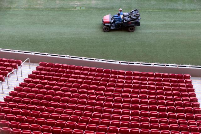 A machine rolls over the new turf at Akron Stadium, home of the Guadalajara soccer club, in Zapopan, Jalisco, Mexico, on March 17, 2026. Akron Stadium will host two World Cup playoff matches next week and will be one of Mexico’s three venues for the 2026 World Cup. (Photo by ULISES RUIZ / AFP)