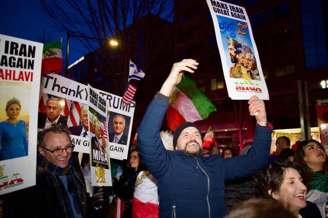 Iranian protesters gather during a demonstration organized by diaspora groups calling for political change in Iran and responding to appeals by opposition figures, outside the Iranian Interests Section in Washington, DC, on March 17, 2026, US President Donald Trump said that he does not know whether Iran's new supreme leader Mojtaba Khamenei is still alive, adding that Washington was unclear whom it could negotiate with in Tehran. (Photo by Amid FARAHI / AFP)