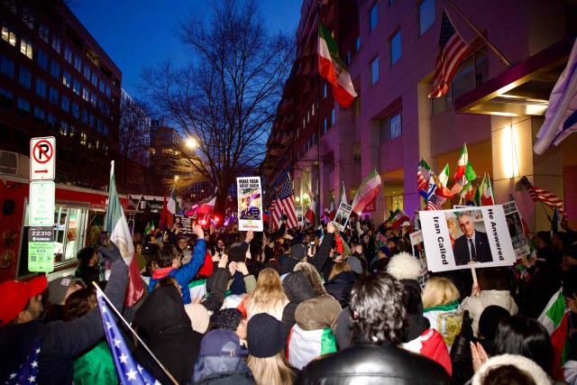 Iranian protesters gather during a demonstration organized by diaspora groups calling for political change in Iran and responding to appeals by opposition figures, outside the Iranian Interests Section in Washington, DC, on March 17, 2026, US President Donald Trump said that he does not know whether Iran's new supreme leader Mojtaba Khamenei is still alive, adding that Washington was unclear whom it could negotiate with in Tehran. (Photo by Amid FARAHI / AFP)