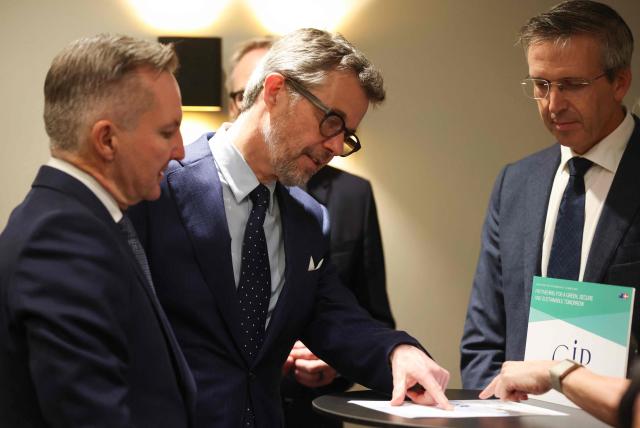 Denmark's King Frederik X (C) and Australia's Minister for Climate Change and Energy Chris Bowen (L) attend a Royal Business Walk with representatives from Danish companies, in Melbourne on March 18, 2026. (Photo by Jesse Thompson / POOL / AFP)