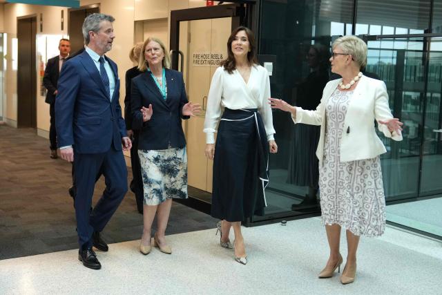 Denmark's King Frederik X (L) and Queen Mary (2nd-R) tour the Murdoch Children’s Research Institute (MCRI) with Professor Melissa Little, Chief Scientist at MCRI (2nd-L) and Professor Kathryn North, Director of MCRI (R) during a tour of the MCRI at the Royal Children’s Hospital in Melbourne on March 18, 2026. (Photo by Asanka Ratnayake / POOL / AFP)