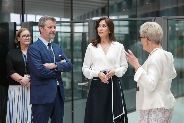 Denmark's King Frederik X (2nd-L) and Queen Mary (2nd-R) tour the Murdoch Children’s Research Institute (MCRI) with Professor Melissa Little, Chief Scientist at MCRI (L) and Professor Kathryn North, Director of MCRI (R) during a tour of the MCRI at the Royal Children’s Hospital in Melbourne on March 18, 2026. (Photo by Asanka Ratnayake / POOL / AFP)