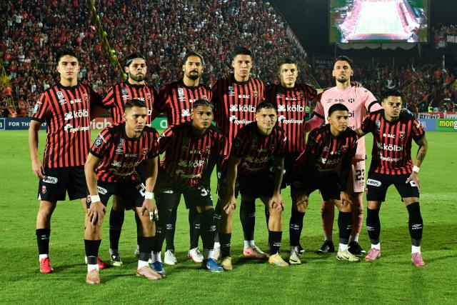 Players of Alajuelense pose for a picture ahead of the CONCACAF Central American Cup round of 16 second leg football match between Costa Rica's Alajuelense and US' Los Angeles FC at the Alejandro Morera Soto Stadium in Alajuela, Costa Rica on March 17, 2026. (Photo by Ezequiel BECERRA / AFP)