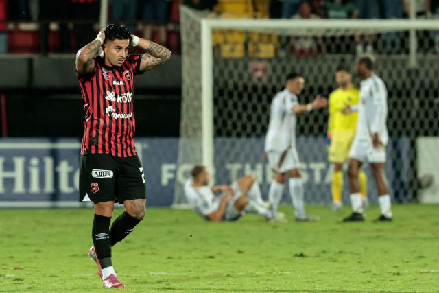 Alajuelense's defender #22 Ronald Matarrita reacts after losing the CONCACAF Central American Cup round of 16 second leg football match between Costa Rica's Alajuelense and US' Los Angeles FC at the Alejandro Morera Soto Stadium in Alajuela, Costa Rica on March 17, 2026. (Photo by JOHN DURAN / AFP)