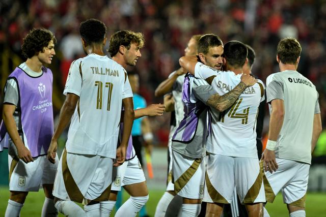 Players of Los Angeles FC celebrate after winning the CONCACAF Central American Cup round of 16 second leg football match between Costa Rica's Alajuelense and US' Los Angeles FC at the Alejandro Morera Soto Stadium in Alajuela, Costa Rica on March 17, 2026. (Photo by Ezequiel BECERRA / AFP)
