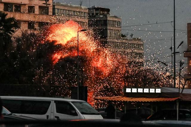 A fireball rises from the site of an Israeli airstrike that targeted a building in Beirut’s Bashoura neighbourhood on March 18, 2026. Lebanon was drawn into the Middle East war on March 2 when Iran-backed militant group Hezbollah launched rockets towards Israel in response to US-Israeli strikes that killed Iranian supreme leader Ayatollah Ali Khamenei. (Photo by FADEL itani / AFP)