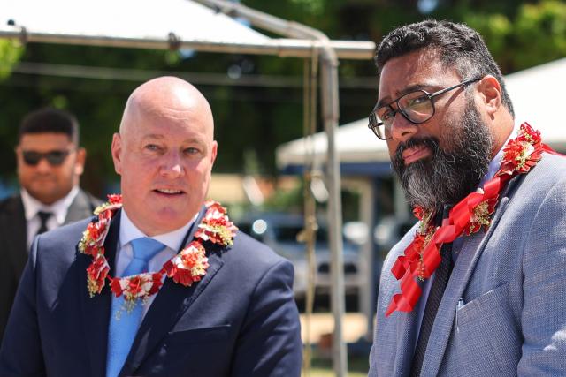 New Zealand's Prime Minister Christopher Luxon (L) and Tonga's Prime Minister Lord Fatafehi Fakafanua attend a police and transnational crime event in Nuku'alofa on March 18, 2026. (Photo by Ben STRANG / AFP)