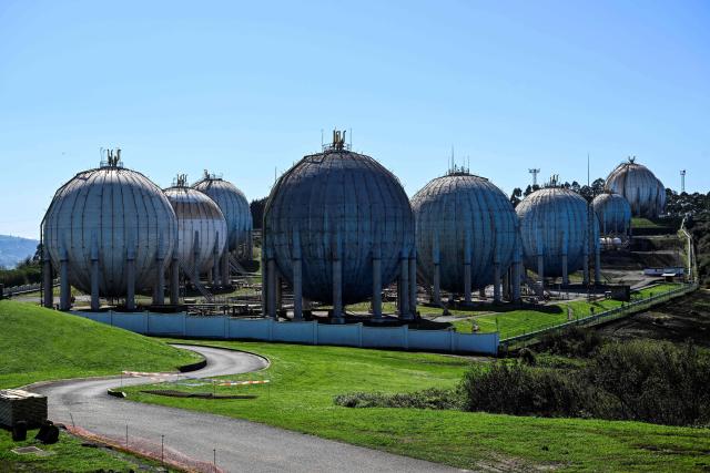 A picture taken on March 17, 2026 shows a general view of the Repsol LPG gas plant in the Spanish city of Gijon. The US-Israeli war on Iran has expanded across the Gulf and beyond, upending global energy markets and trade, and virtually halting traffic in the Strait of Hormuz, through which a fifth of the world's crude oil travels. (Photo by ANDER GILLENEA / AFP)