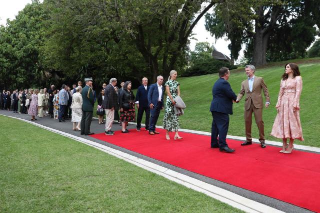 Denmark's King Frederik X (2nd R) and Queen Mary (R) greet guests during ‘An Evening in the Garden’ at the Royal Botanic Gardens in Melbourne on March 18, 2026. (Photo by Jesse Thompson / POOL / AFP)