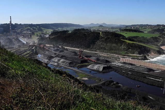 A picture taken on March 17, 2026 shows a general view of the Abono coal-fired power plant in the Spanish city of Gijon. The US-Israeli war on Iran has expanded across the Gulf and beyond, upending global energy markets and trade, and virtually halting traffic in the Strait of Hormuz, through which a fifth of the world's crude oil travels. (Photo by ANDER GILLENEA / AFP)