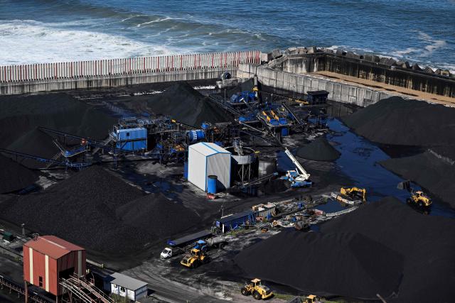 A picture taken on March 17, 2026 shows a general view of the Abono coal-fired power plant in the Spanish city of Gijon. The US-Israeli war on Iran has expanded across the Gulf and beyond, upending global energy markets and trade, and virtually halting traffic in the Strait of Hormuz, through which a fifth of the world's crude oil travels. (Photo by ANDER GILLENEA / AFP)