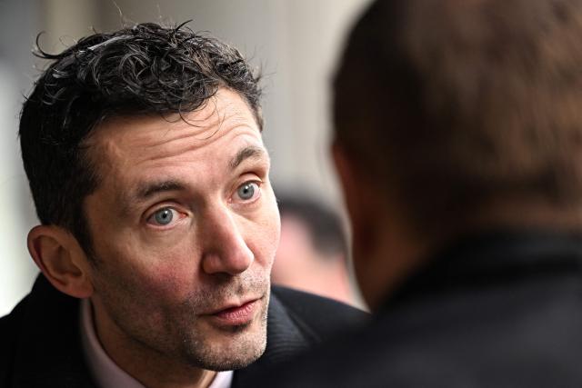 French far-right party Rassemblement National (RN) candidate for mayor of Nimes Julien Sanchez reacts as he campaigns in Nimes, southern France on March 18, 2026, ahead of the second round of the municipal elections. (Photo by Gabriel BOUYS / AFP)
