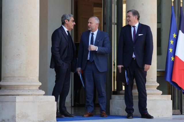 (From L) France's Trade Minister Serge Papin, France's junior Minister in charge of parliament relations Laurent Panifous and France's Transports Minister Philippe Tabarot leave after the weekly cabinet meeting at the presidential Elysee Palace in Paris on March 18, 2026. (Photo by Ludovic MARIN / AFP)