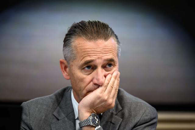 Omega CEO Raynald Aeschlimann looks on during a press conference to present the Swiss watchmaker giant Swatch Group's annual results in Biel on March 18, 2026. Swatch reported a plunge in net profit last year on weak demand for movements and other components, though it forecast a strong recovery in 2026. (Photo by Fabrice COFFRINI / AFP)