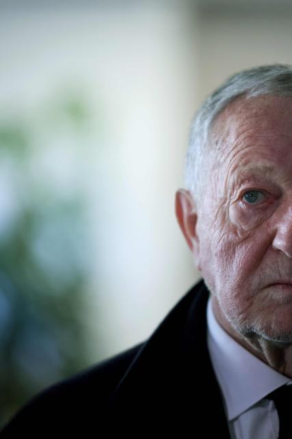 President of Business software publisher Cegid, vice-President of French football federation (FFF) and candidate for mayor in Lyon, Jean-Michel Aulas looks on during a visit of the former offices of the French food company Lustucru, for a housing development project in Lyon, central eastern France, on March 18, 2026. (Photo by Alex MARTIN / AFP)