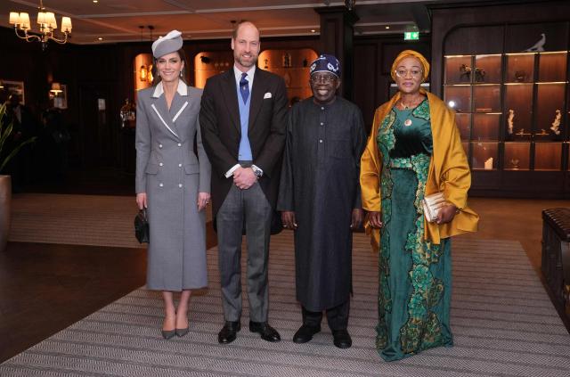 Britain's Prince William, Prince of Wales and wis wife Britain's Catherine, Princess of Wales pose alongside Nigeria's President Bola Tinubu and his wife Oluremi Tinubu as they greet them at the Fairmont Hotel in Windsor on March 18, 2026, on the first day of a two-day State Visit to the United Kingdom by Nigeria's President. (Photo by Yui Mok / POOL / AFP)
