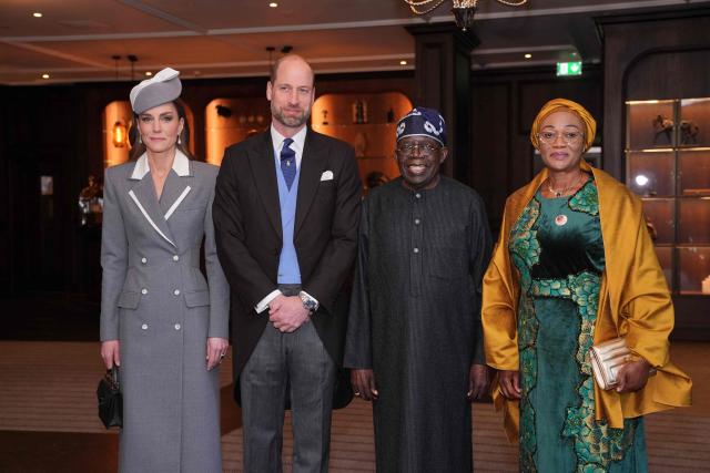 Britain's Prince William, Prince of Wales and wis wife Britain's Catherine, Princess of Wales pose alongside Nigeria's President Bola Tinubu and his wife Oluremi Tinubu as they greet them at the Fairmont Hotel in Windsor on March 18, 2026, on the first day of a two-day State Visit to the United Kingdom by Nigeria's President. (Photo by Yui Mok / POOL / AFP)