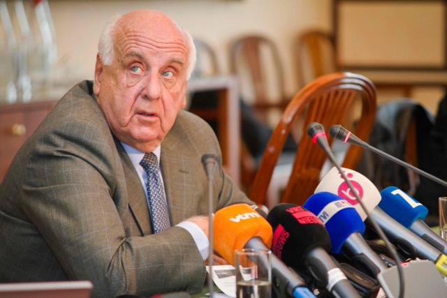 (FILES) Then Brussels Airlines Chairman of the board of directors Viscount Etienne Davignon addresses media representatives at a press conference after an Extraordinary Works Council of Brussels Airlines in Brussels on October 8, 2012. A 93-year-old former Belgian diplomat was ordered on March 17, 2026, to stand trial for participation in "war crimes" over his role leading up to the 1961 killing of Congolese independence icon Patrice Lumumba. Etienne Davignon, a one-time European commissioner, is the only person still alive among 10 Belgians accused by the Congolese leader's family of complicity in his murder (Photo by AURORE BELOT / BELGA / AFP) / Belgium OUT