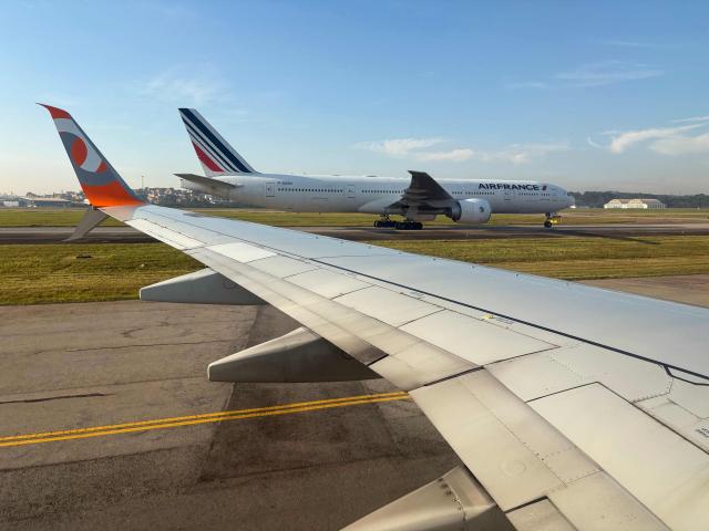 An Air France plane (top) and a GOL Airlines plane are seen on runways at Guarulhos International Airport in Sao Paulo, Brazil, on March 18, 2026. (Photo by Pablo PORCIUNCULA / AFP)