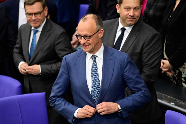 German Chancellor Friedrich Merz arrives for a session at the Bundestag (lower house of parliament) in Berlin on March 18, 2026, ahead of a summit of the European Union. (Photo by John MACDOUGALL / AFP)