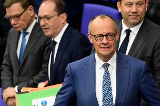 German Chancellor Friedrich Merz arrives for a session at the Bundestag (lower house of parliament) in Berlin on March 18, 2026, ahead of a summit of the European Union. (Photo by John MACDOUGALL / AFP)