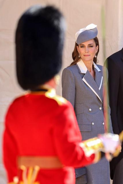 Britain's Catherine, Princess of Wales looks toward a member of the 1st Battalion Grenadier Guards, during a ceremonial welcome in the Quadrangle at Windsor Castle, in Windsor, on March 18, 2026, on the first day of a two-day State Visit to the United Kingdom by Nigeria's President. (Photo by Chris Jackson / POOL / AFP)