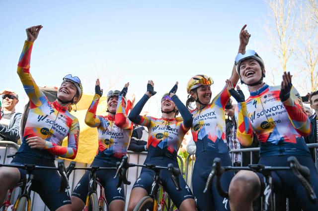 SD Worx-Protime riders celebrate the victory of their teammate Lotte Kopecky (not pictured) after the 'Nokere Koerse' one day women cycling race, 133,3km from Deinze to Nokere, on March 18, 2026. (Photo by ELIAS ROM / Belga / AFP) / Belgium OUT