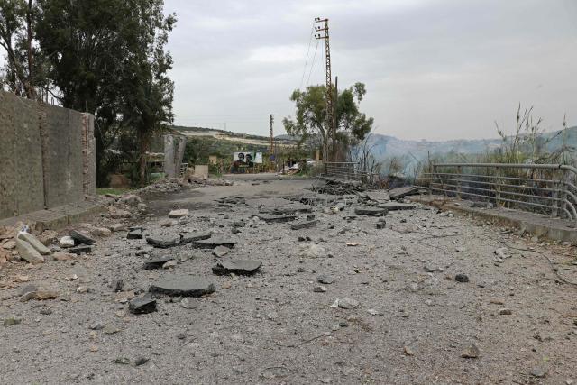 This photograph shows the destroyed Qasmiye Bridge built over the Litani River, following an Israeli airstrike, in Qasmiye on March 18, 2026. The Israeli military said it planned to strike bridges and crossings over the Litani River in southern Lebanon on March 18 to disrupt what it said were Hezbollah arms?smuggling routes. (Photo by KAWNAT HAJU / AFP)