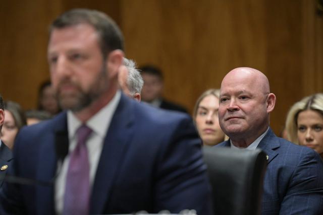 Sean O'Brien (R), General President of the International Brotherhood of Teamsters, looks on as US Senator Markwayne Mullin (R-OK), nominee to be Secretary of Homeland Security, testifies during a Senate Committee on Homeland Security and Governmental Affairs confirmation hearing on Capitol Hill in Washington, DC, on March 18, 2026. (Photo by Oliver Contreras / AFP)