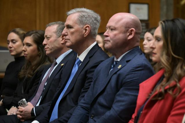 (From 3L to R) US Representative Josh Gottheimer, Democrat from New Jersey, former US Speaker of the House Kevin McCarthy, Sean O'Brien, General President of the International Brotherhood of Teamsters, and Christine Mullin look on as Senator Markwayne Mullin (R-OK), nominee to be Secretary of Homeland Security, testifies during a Senate Committee on Homeland Security and Governmental Affairs confirmation hearing on Capitol Hill in Washington, DC, on March 18, 2026. (Photo by Oliver Contreras / AFP)