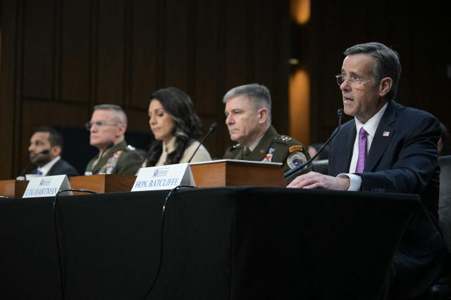 (L/R) FBI Director Kash Patel, Director of Defense Intelligence Agency (DIA) James Adams III, US Director of National Intelligence Tulsi Gabbard, Acting Commander of US Cyber Command William Hartman, and CIA Director John Ratcliffe testify during a Senate Committee on Intelligence hearing to examine worldwide threats, on Capitol Hill in Washington, DC, on March 18, 2026. (Photo by Oliver Contreras / AFP)