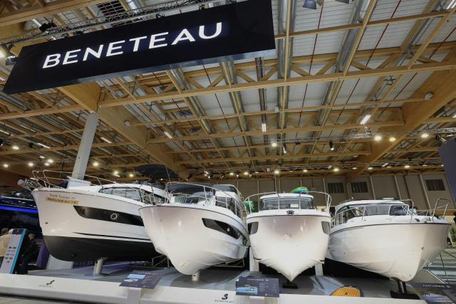 (FILES) Vessels are displayed on the stand of Beneteau boat builder on the opening day of the 2025 Paris Nautic Show at Le Bourget Exhibition Centre at Le Bourget on the outskirts of Paris on November 26, 2025. The French boating group Beneteau has posted a net loss of 43 million euros in 2025, following “a combination of inflation and rising interest rates” linked in particular to U.S. customs duties, executive board chairman Bruno Thivoyon said on March 18, 2026. (Photo by Thomas SAMSON / AFP)
