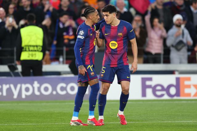 Barcelona's Brazilian forward #11 Raphinha (L) celebrates scoring his team's first goal with teammate Barcelona's Spanish defender #05 Pau Cubarsi during the UEFA Champions League last 16 second leg football match between FC Barcelona and Newcastle United at the Camp Nou stadium in Barcelona, on March 18, 2026. (Photo by Josep LAGO / AFP)