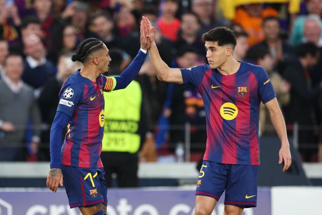 Barcelona's Brazilian forward #11 Raphinha (L) celebrates scoring his team's first goal with teammate Barcelona's Spanish defender #05 Pau Cubarsi during the UEFA Champions League last 16 second leg football match between FC Barcelona and Newcastle United at the Camp Nou stadium in Barcelona, on March 18, 2026. (Photo by Josep LAGO / AFP)