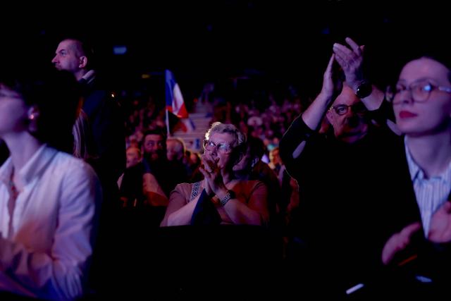TOPSHOT - A member of the audience looks on during a party rally following the results of the first round of France's 2026 municipal elections, in Chalons-en-Champagne, on March 17, 2026. (Photo by Sameer AL-DOUMY / AFP)