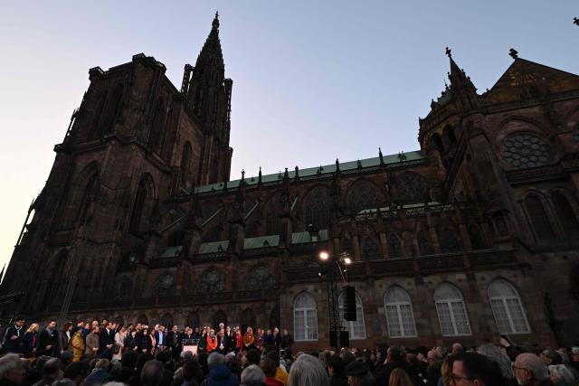Strasbourg mayoral candidate Catherine Trautmann delivers a speech during a public meeting in front of the Strasbourg Cathedral as part of her campaign for the municipal election runoff in Strasbourg on March 18, 2026. (Photo by SEBASTIEN BOZON / AFP)