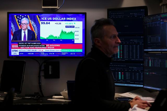 A livestream shows Jerome Powell, chairman of the US Federal Reserve, speaking after a Federal Open Market Committee (FOMC) meeting on the floor of the New York Stock Exchange (NYSE) in New York on March 18, 2026. The US Federal Reserve kept interest rates unchanged Wednesday as expected, in defiance of President Donald Trump as the world's largest economy battles stubborn inflation, weak labor demand and an "uncertain" economic outlook due to the war in Iran. The Fed's 11-1 vote kept rates steady at a range between 3.50 percent and 3.75 percent, with officials flagging one expected rate cut by the end of the year. (Photo by ANGELA WEISS / AFP)