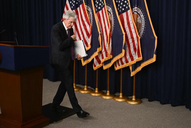 US Federal Reserve Chair Jerome Powell departs after holding a press conference following the Federal Open Market Committee meeting at the Federal Reserve Board Building in Washington, DC, on March 18, 2026. The US Federal Reserve kept interest rates unchanged Wednesday as expected, in defiance of President Donald Trump as the world's largest economy battles stubborn inflation, weak labor demand and an "uncertain" economic outlook due to the war in Iran. The Fed's 11-1 vote kept rates steady at a range between 3.50 percent and 3.75 percent, with officials flagging one expected rate cut by the end of the year. (Photo by Brendan SMIALOWSKI / AFP)