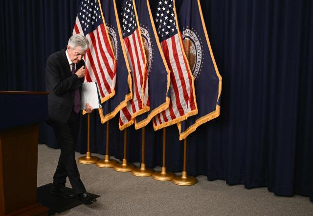 US Federal Reserve Chair Jerome Powell departs after holding a press conference following the Federal Open Market Committee meeting at the Federal Reserve Board Building in Washington, DC, on March 18, 2026. The US Federal Reserve kept interest rates unchanged Wednesday as expected, in defiance of President Donald Trump as the world's largest economy battles stubborn inflation, weak labor demand and an "uncertain" economic outlook due to the war in Iran. The Fed's 11-1 vote kept rates steady at a range between 3.50 percent and 3.75 percent, with officials flagging one expected rate cut by the end of the year. (Photo by Brendan SMIALOWSKI / AFP)